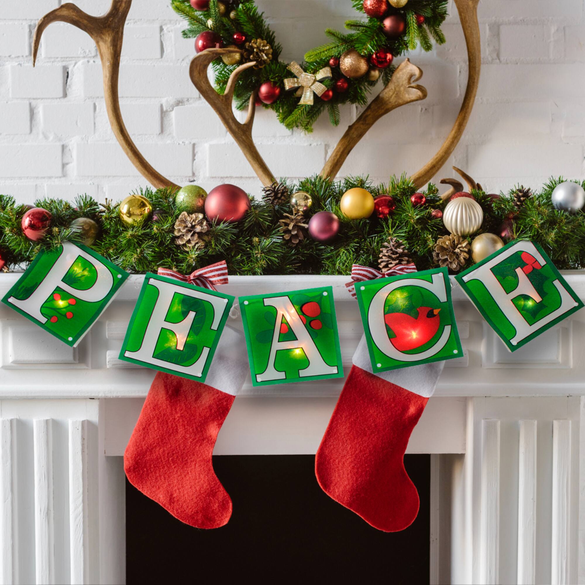 4.5ft. Shimmering Green Lighted Peace Garland